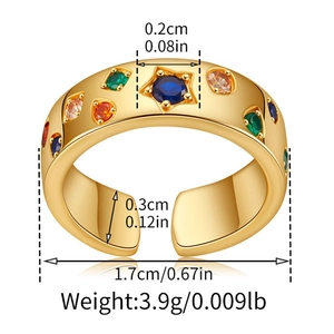 Detail of gold zircon ring with blue star stone and colorful gems including dimensions