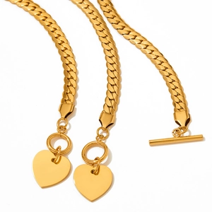 Golden heart pendant necklace and bracelet set with lobster and toggle clasps