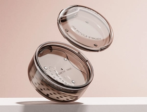Detail of a smoky transparent portable dental storage box with magnetic base feature