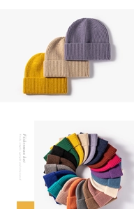 Detailed view of rib-knit winter beanies showing over 20 vibrant color options for women