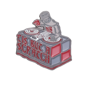 Monty Python inspired Black Knight DJ enamel pin with 'Tis But A Scratch' text