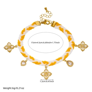 Handmade woven twist chain bracelet with gold plated flower and teardrop crystal charms