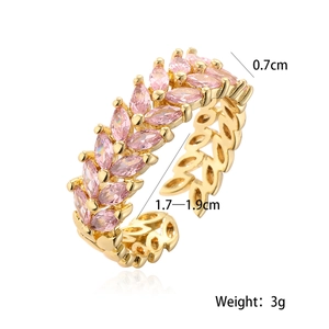 Detail of gold wheat leaf ring with pink zircon stones and dimension markers