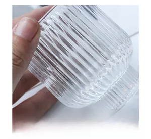 Macro shot of fluted clear glass texture on a versatile Nordic double-use candle holder
