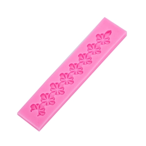 Pink silicone four-leaf clover pattern mold for long strip cake borders and chocolate diy