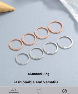 Close-up of minimalist silver and rose gold 925 sterling silver stacked eternity rings