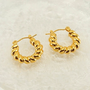 Polished golden stainless steel twisted hoop earrings with a chunky croissant design