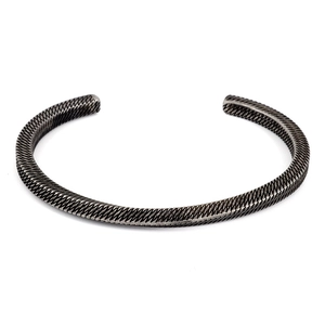 Vintage stainless steel open bangle with unique scale texture and woven metal finish