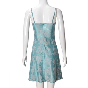 Detail of a hidden back zipper on a blue floral satin slip dress with a slim fit