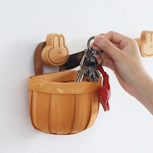 Cute rabbit-shaped wooden wall hook with woven storage basket for home organization