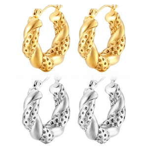 Détails de créoles torsadées en or 18 carats et argent avec texture nid d'abeille