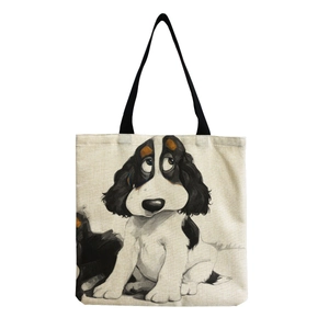 Detail of canvas tote bag featuring an artistic black and white cartoon dog illustration