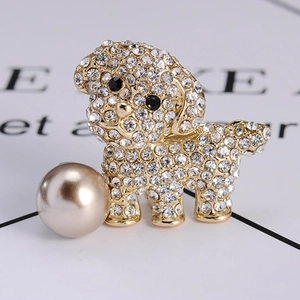 Exquisite gold puppy brooch with sparkling rhinestones and a large pearl accent