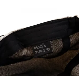 Detail of herringbone cap lining with 80% cotton washing label and precise stitching