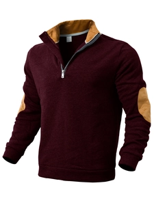 Macro view of burgundy outdoor sweatshirt showing high collar with quarter-zip detail