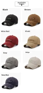 Detail view of seven vintage washed cotton baseball caps with GUHHA embroidery in various colors
