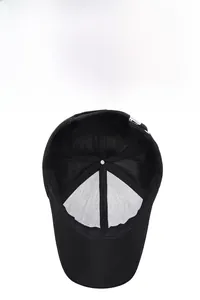 Detail of breathable mesh lining and adjustable strap on a black outdoor baseball cap