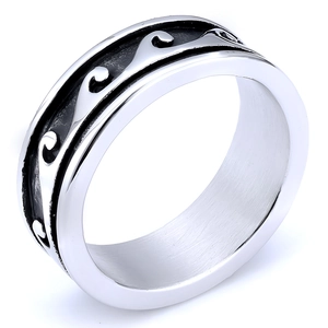Macro view of men's Viking wave pattern steel ring with oxidized embossed details