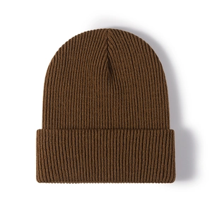 Brown ribbed knit beanie hat for winter warmth with thick textured wool fabric