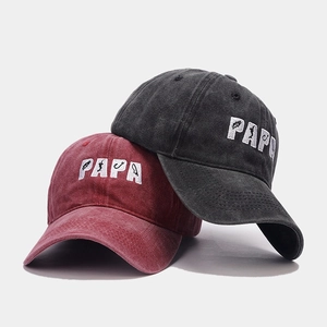 Close-up of PAPA 3D embroidery on washed cotton sun hat with fishing motif detail