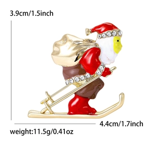 Skiing Santa Claus brooch with crystals and measurements of 4.4cm x 3.9cm