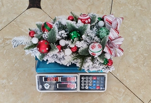 Detailed view of festive Christmas ball door hanging ornament weighing 0.320kg