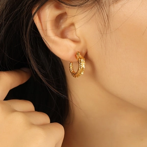 Golden dragon-shaped C-style titanium steel earrings with irregular molten texture design