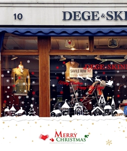 Detailed Christmas window decals showing reindeer sleigh and snowflake silhouettes