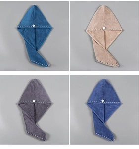 Detail view of thickened microfiber hair drying caps in four assorted solid colors