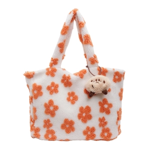 Weiße Plüsch-Tasche mit orangefarbenem Blumenmuster und süßem Bärenanhänger