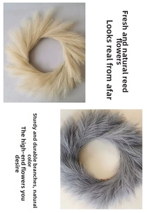 Detailed view of artificial reed wreath with fluffy cream and light gray textured fibers