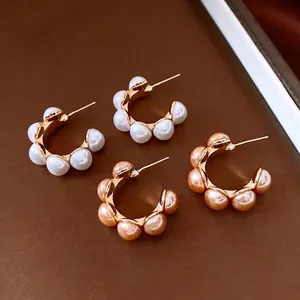 Boucles d'oreilles vintage plaquées or 18 carats avec perles blanches et champagne