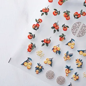 3D embossed nail art stickers featuring persimmon and kumquat motifs for DIY manicures