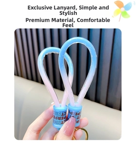 Close-up of blue and pink gradient silicone lanyard with golden metal keychain ring