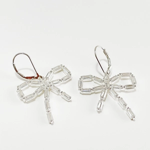 Elegant 925 silver bow stud earrings featuring sparkling rectangular zircon stones