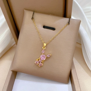 Elegant gold titanium steel necklace featuring a sparkling pink zircon rabbit pendant