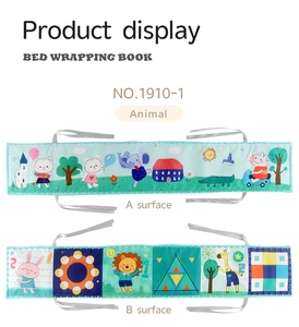 Detailed view of double-sided baby cloth book with colorful animal and shape patterns
