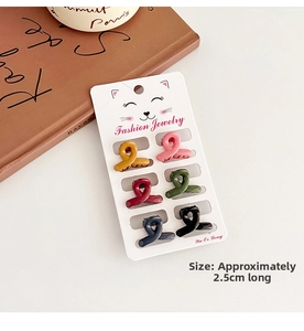 Set of six 2.5cm mini knot hair claws in Morandi colors on a white display card