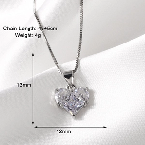 Detailed view of silver heart pendant with dimensions 13x12mm and 45cm chain length