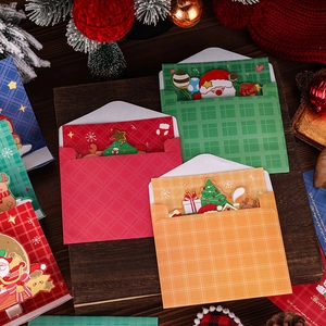 3D Christmas greeting cards set with plaid envelopes and gold stamping on wood background