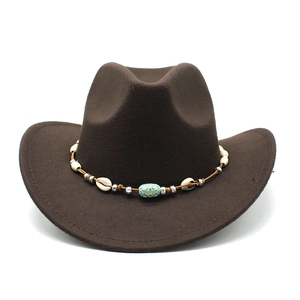 Detailed view of dark brown wool cowboy hat featuring a tribal shell and bead headband