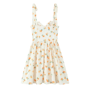 Summer mini dress with orange citrus print, adjustable tie straps and ruffled neckline
