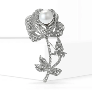 Vintage silver rose brooch with large pearl center and crystal rhinestones on petals