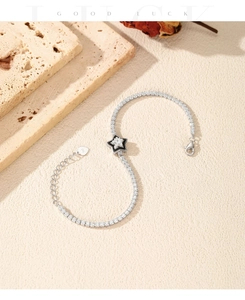 Detail of S925 sterling silver star tennis bracelet with cubic zirconia and lobster clasp