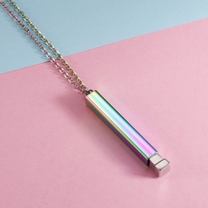Rainbow rectangular column pendant necklace with silver knob base on pink blue backdrop