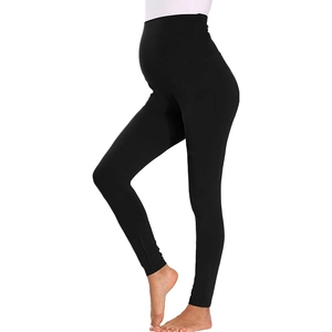 Slim fit high-waisted maternity yoga pants with belly support in black cotton stretch