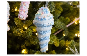 Close-up of ice cream scoop Christmas ornament with colorful foam beads on pine branch