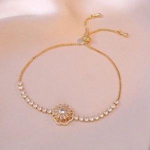 Bracciale dorato con ciondolo a girasole in zircone e catena regolabile a tirante