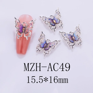 Detail of laser iridescent butterfly nail charm with silver frame, size 15.5x16mm