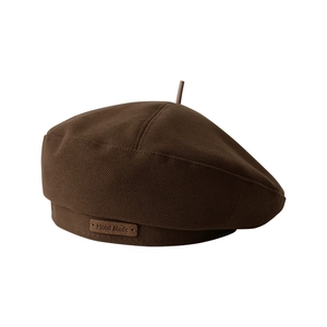 Classic dark brown wool beret hat with textured twill fabric and handmade leather label